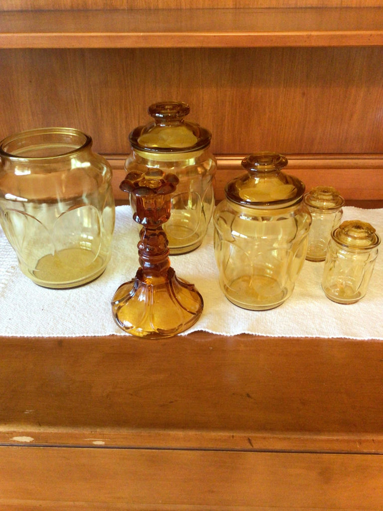 Amber glass jars with lids and candle holder - image 1 of 3