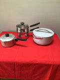 Set of metal cookware with lids and steamer insert - thumbnail 1 of 8