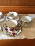 Floral bone china teacups and saucers with gold trim - thumbnail 3 of 7
