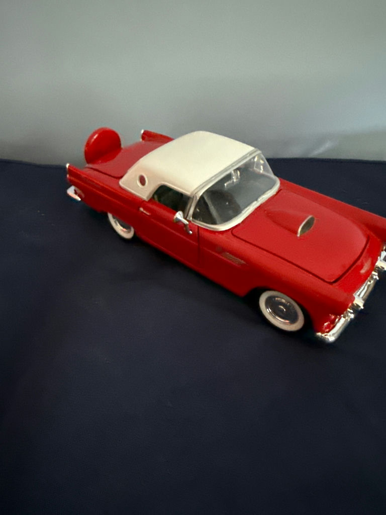 Red and white vintage die-cast toy cars: a convertible and a VW-style bus - image 2 of 5