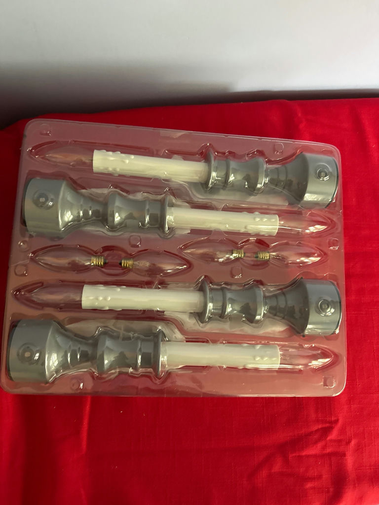 Four gray and white light socket components with bulbs - image 1 of 2