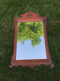Decorative wooden-framed mirror with eagle crest 38.5x25 - thumbnail 1 of 2