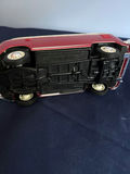 Red and white vintage die-cast toy cars: a convertible and a VW-style bus - thumbnail 5 of 5