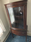 Dark wood corner display cabinet with glass doors and bottom drawer - thumbnail 2 of 3