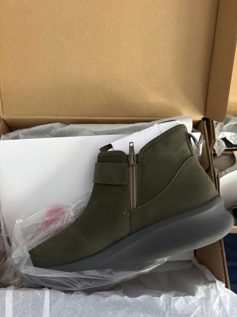 Olive-green ankle boot and white strappy sandal with Clarks Cloudsteppers boxes - image 2 of 4