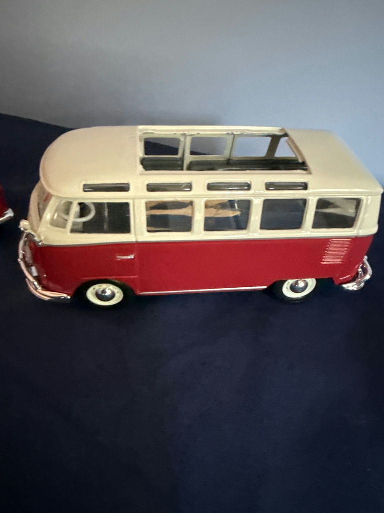 Red and white vintage die-cast toy cars: a convertible and a VW-style bus - image 3 of 5