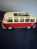 Red and white vintage die-cast toy cars: a convertible and a VW-style bus - thumbnail 3 of 5