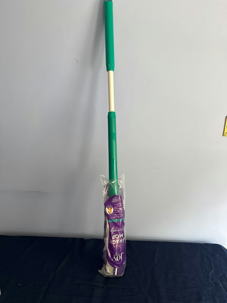 Miracle mop Green and cream mop with purple packaging - image 1 of 2
