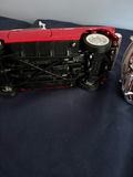 Red and white vintage die-cast toy cars: a convertible and a VW-style bus - thumbnail 4 of 5
