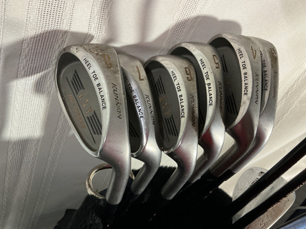 Golf bag with clubs, balls, and tees - image 5 of 6