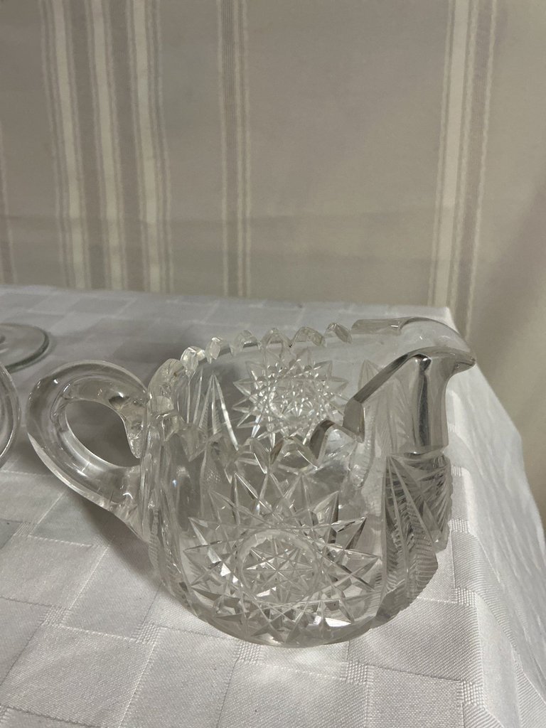Crystal glassware set with champagne flutes and cut-glass pitchers - image 1 of 5