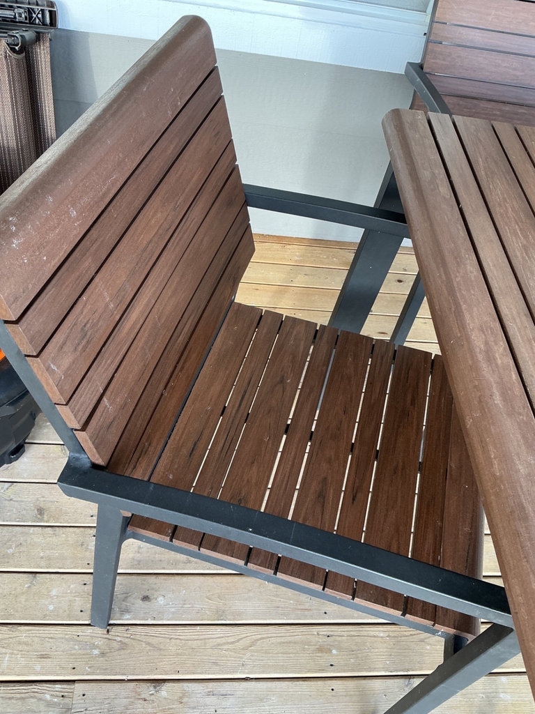 Crate & Barrel Outdoor dining table with four wooden slat chairs - image 4 of 8
