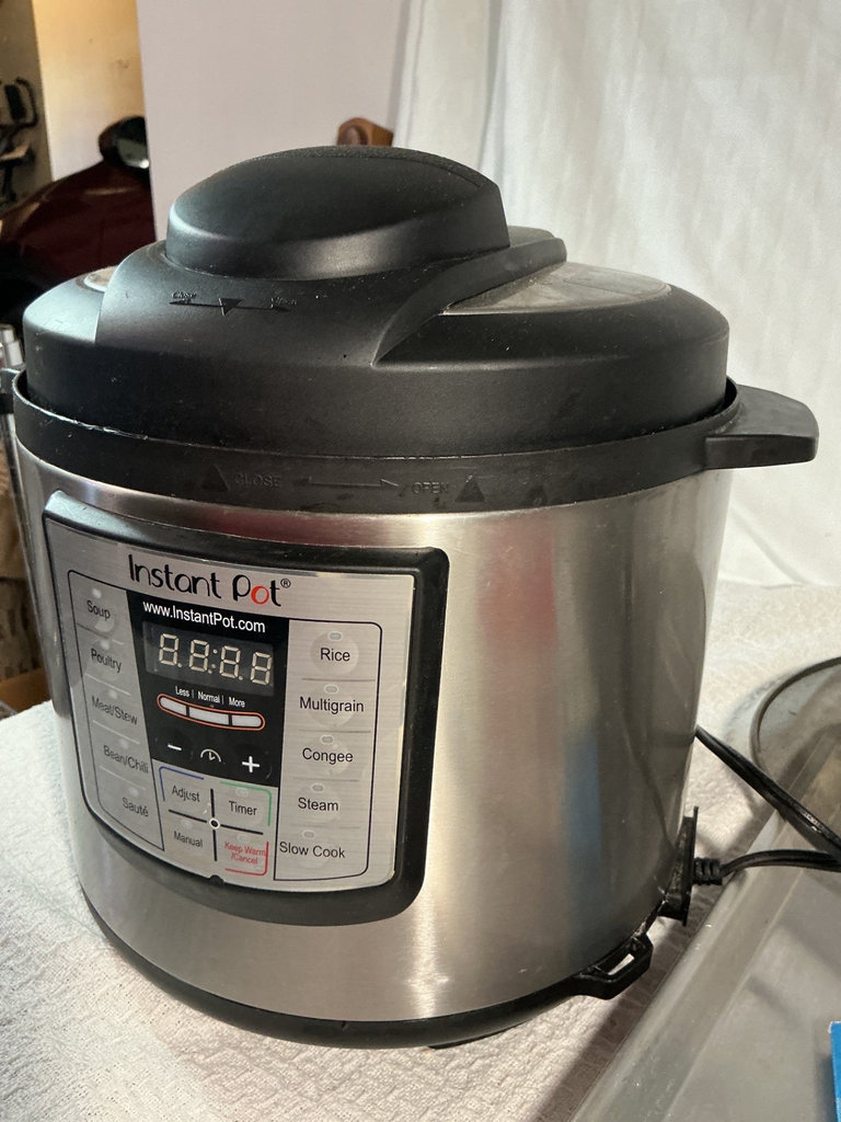 Instant Pot electric pressure cooker and more - image 3 of 5