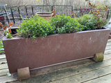 Rectangular rust-colored planters filled with plants - thumbnail 2 of 4