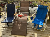 Outdoor lounge chairs and grilling skewers - thumbnail 2 of 8