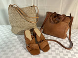 Tan knot-front Everlane sandals, straw woven bag, and Madewell leather tote - thumbnail 1 of 8