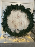 Evergreen wreath with lights and copper starburst ornaments - thumbnail 3 of 4