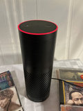 Amazon Echo with a collection of music CDs - thumbnail 2 of 3