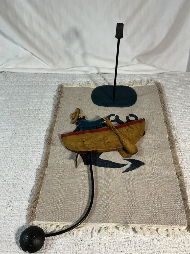 Folk-art canoeist sculpture on stand - image 3 of 3