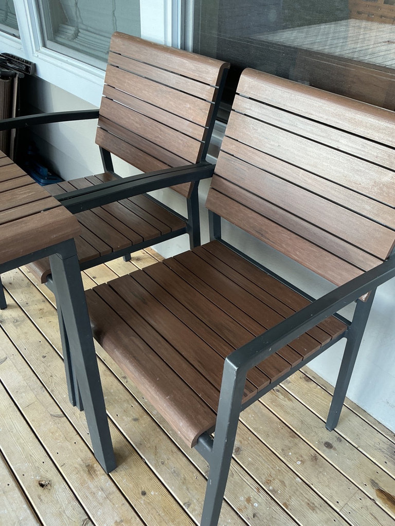 Crate & Barrel Outdoor dining table with four wooden slat chairs - image 5 of 8