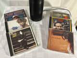 Amazon Echo with a collection of music CDs - thumbnail 1 of 3