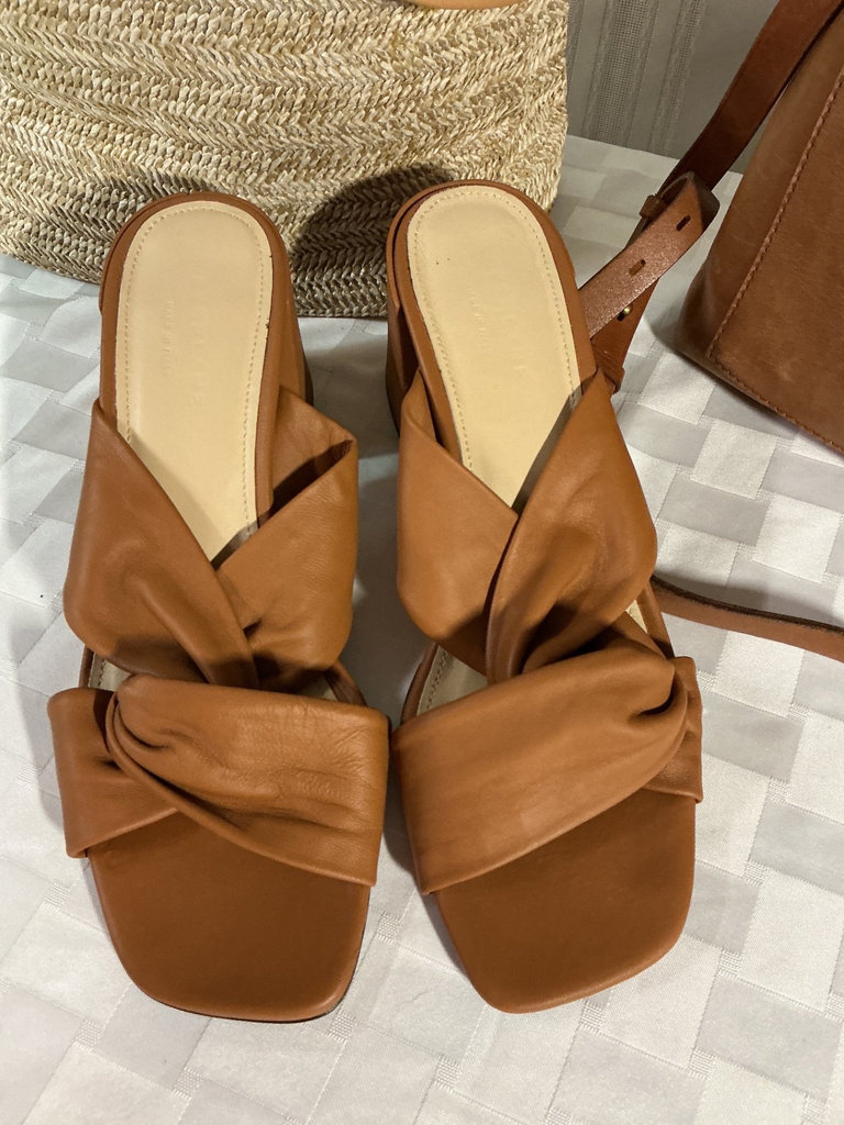 Tan knot-front Everlane sandals, straw woven bag, and Madewell leather tote - image 2 of 8