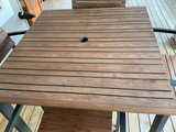 Crate & Barrel Outdoor dining table with four wooden slat chairs - thumbnail 3 of 8