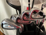 Golf bag with multiple golf clubs - thumbnail 2 of 6