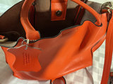 Orange tote bag, black round crossbody bag, and leopard-print zipper pouch - thumbnail 6 of 6