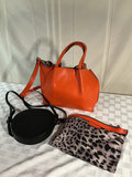 Orange tote bag, black round crossbody bag, and leopard-print zipper pouch - thumbnail 2 of 6