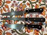 Cast-iron pizza pan, four kitchen knives, cookbooks, and decorative textiles - thumbnail 6 of 6
