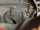 Orange tote bag, black round crossbody bag, and leopard-print zipper pouch - thumbnail 5 of 6