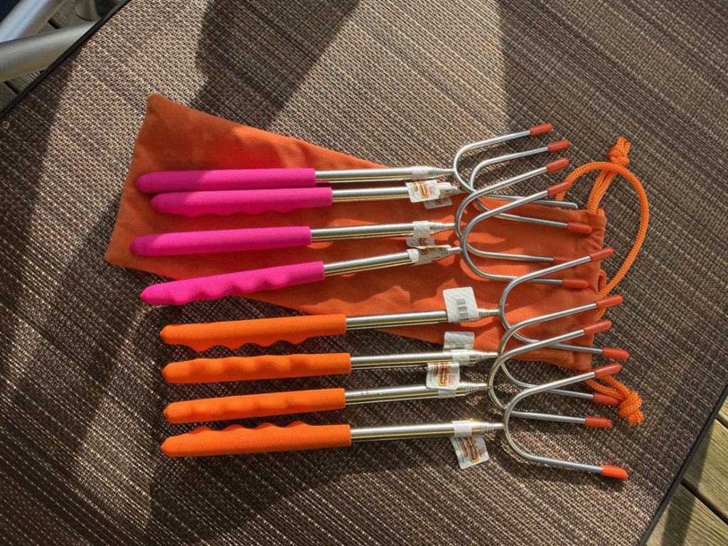 Outdoor lounge chairs and grilling skewers - image 3 of 8