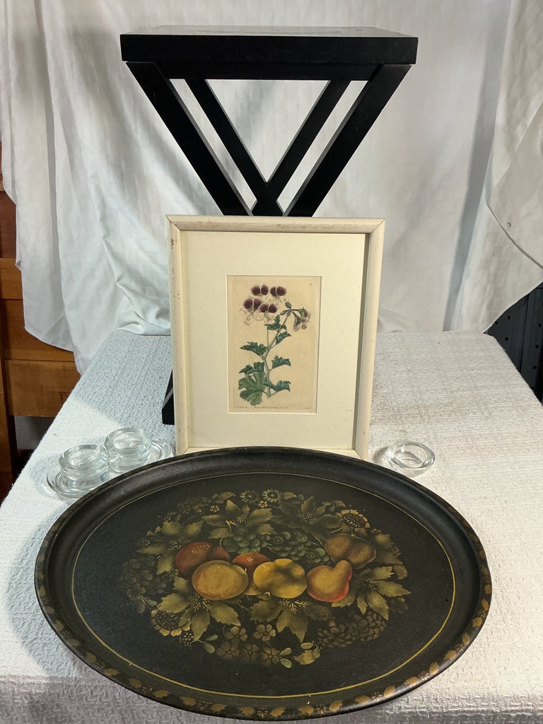 X-frame black table, framed botanical print, and fruit-themed decorative tray - image 1 of 7