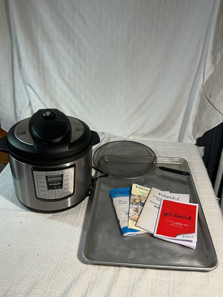 Instant Pot electric pressure cooker and more - image 1 of 5
