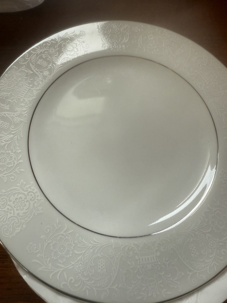 White porcelain dinnerware set with plates, bowls, and saucers - image 2 of 4