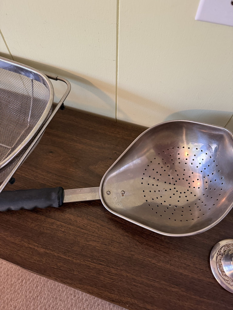 Vintage kitchenware collection including silver-plated creamer, crystal glassware, strainers and wire dish rack - image 5 of 7