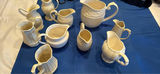 Assorted White Ceramic Pitchers and Creamers - thumbnail 1 of 3