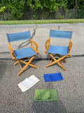 Pair of folding director's chairs with blue fabric and three additional cloth seat sets - thumbnail 1 of 6