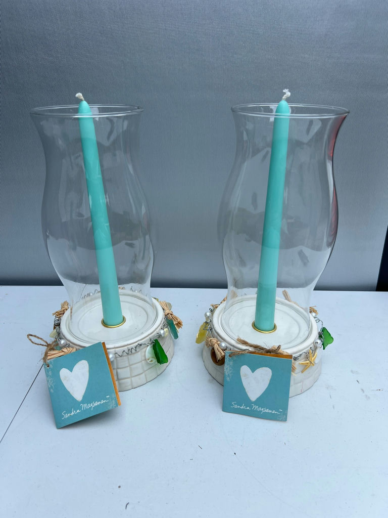 Pair of coastal candle holders with teal candles - image 1 of 6