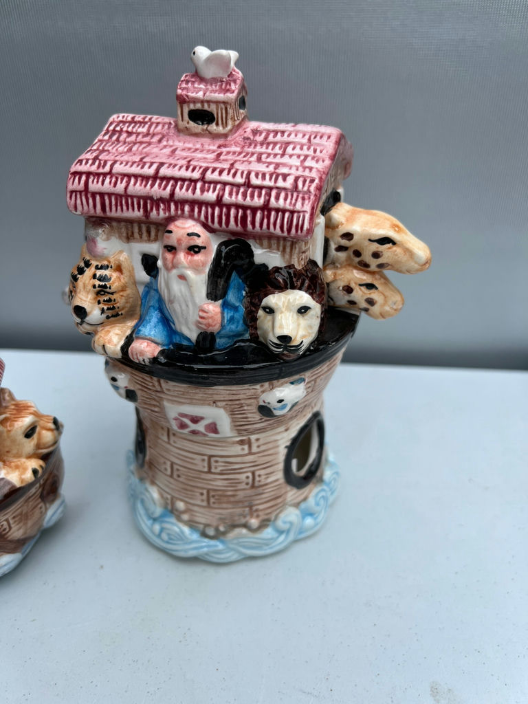 Three ceramic figurines: salt and pepper shakers pink-roofed houses and a brick-tower scene - image 2 of 5