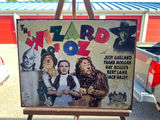 Wizard of Oz 70th Anniversary poster featuring Judy Garland and cast 16 x 12-1/2 - thumbnail 1 of 4