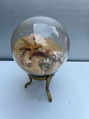 Glass globe sand display with seashells and starfish on brass stand - Image 1 of 4