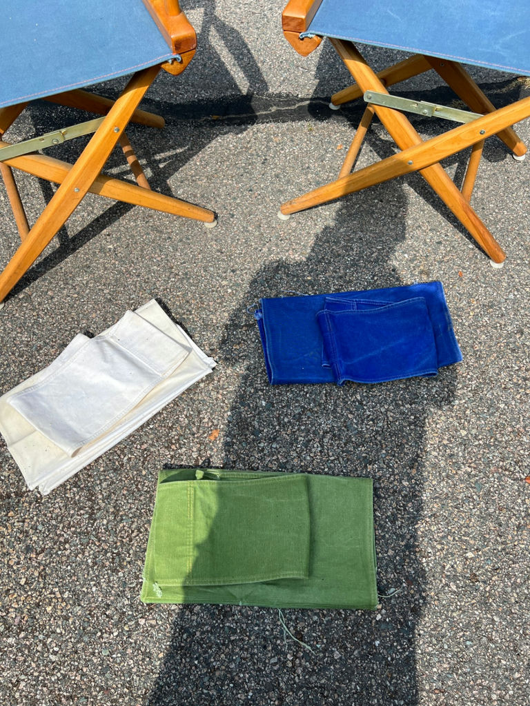 Pair of folding director's chairs with blue fabric and three additional cloth seat sets - image 6 of 6