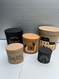 Decorative NESTING round storage boxes with home-themed artwork - thumbnail 1 of 7