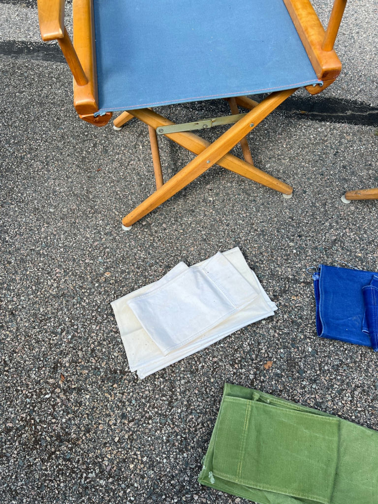 Pair of folding director's chairs with blue fabric and three additional cloth seat sets - image 4 of 6