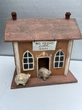 Decorative wooden inn with pig figures - thumbnail 1 of 4