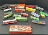 Assorted Model Train Cars, Locomotives, and Toy Airplanes - thumbnail 1 of 6