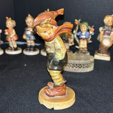 Collection of Hummel Figurines and Decorative Plate - thumbnail 7 of 8