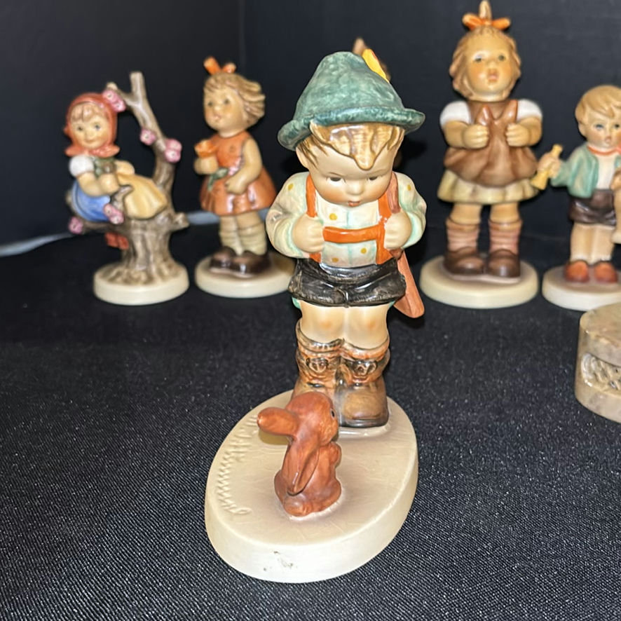 Collection of Hummel Figurines and Decorative Plate - image 8 of 8